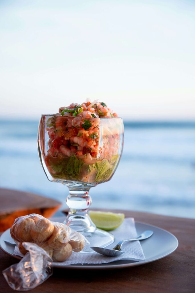 Ceviche in a glass bowl from Cozumel, Mexico, by the beach